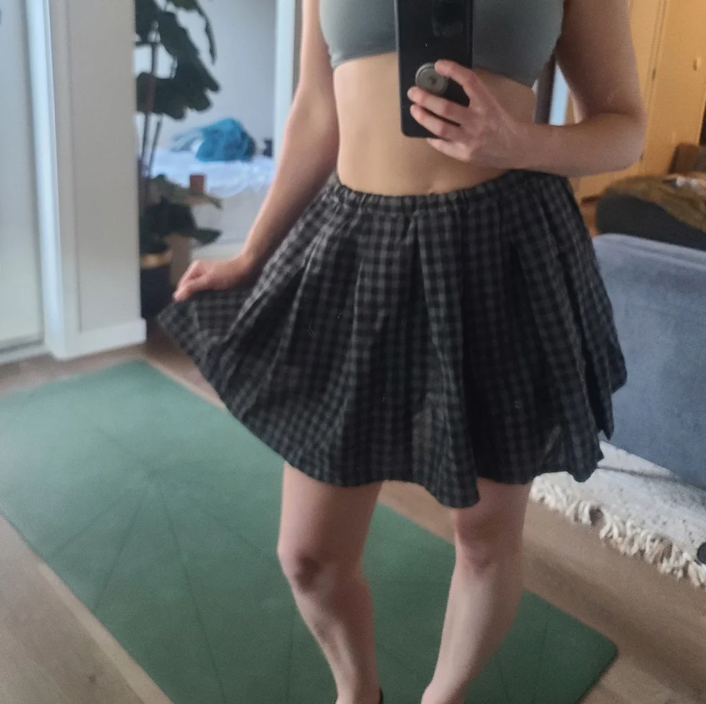 Black plaid skirt